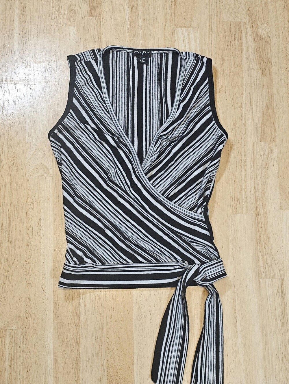 Stylish Black & White Striped Sleeveless Blouse